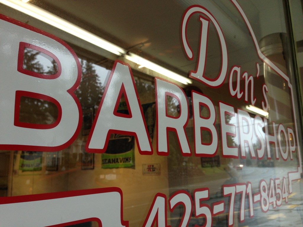 Custom vinyl window graphics for Dan's Barber Shop of Edmonds, WA